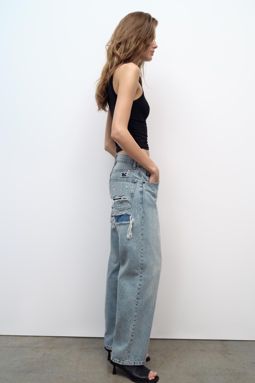De Populære Slidte Naes Jeans