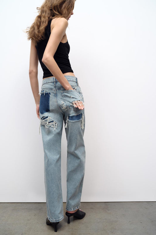 De Populære Slidte Naes Jeans